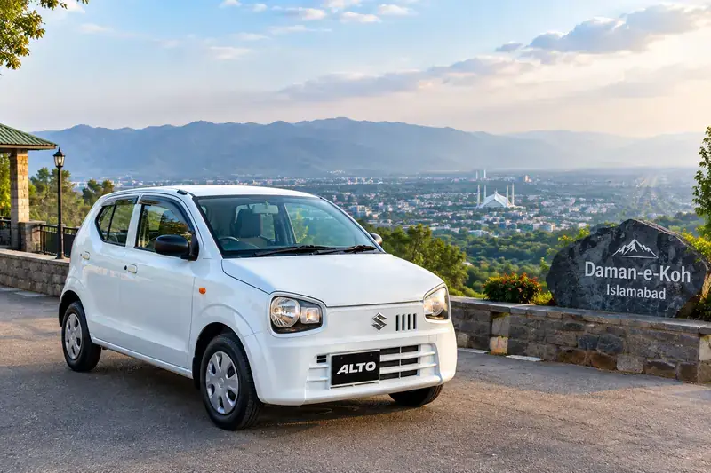 White Suzuki Alto hatchback available for rent in Islamabad